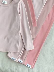 SHEIN LMoss Kids 6件套少女秋冬修身保暖套装，包括圆领长袖上衣、字母装饰打底裤、柔软亲肤保暖内衣和睡衣。 - 粉色 - 查看 2