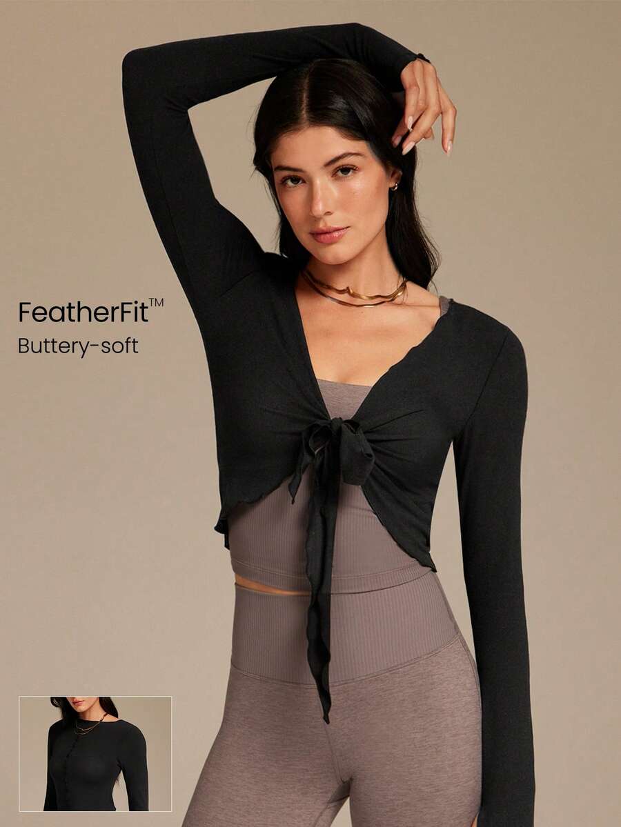 GLOWMODE Áo FeatherFit™ Glide Lite mềm mại, co giãn, thấm hút mồ hôi, có thể mặc hai mặt, thắt eo phía trước và có lỗ xỏ ngón tay cái, dài đến eo, tay dài, thích hợp cho yoga, pilates, tập luyện, mặc hàng ngày, mùa xuân hè. - màu đen - Xem 1