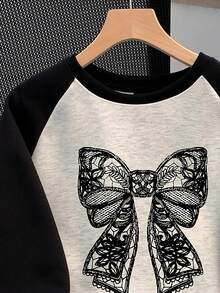 Resyla 女士休闲秋冬畅销蝴蝶结印花撞色宽松卫衣，大码 - 彩色 - 查看 5