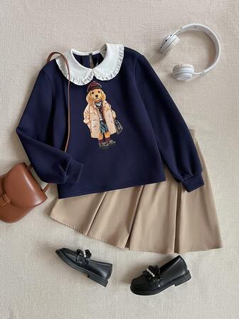 PrepCrw Conjunto de 2 piezas de blusa de polo de manga larga con gráfico de perro elegante y cuello blanco, y falda plisada caqui para niñas preadolescentes, adecuado para salidas casuales, viajes, reuniones, vacaciones, fiestas, otoño e invierno