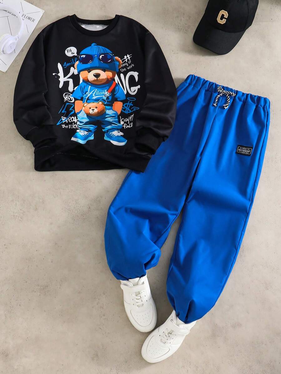 SHEIN 2件套 时尚白色长袖卫衣搭配橄榄绿长裤,适合青少年男孩的时尚套装。卫衣采用绿色图案印花,面料柔软舒适,适合春秋季穿着,适合上学、外出和其他场合。 - 黑色 - 查看 1