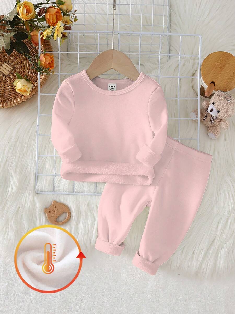 女童纯粉色圆领长袖上衣搭配长裤，简约甜美，百搭实用，针织弹力面料，舒适柔软，加厚保暖内里，适合秋冬季穿着。 - 藕粉色 - 查看 1