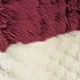 عنابي اللون