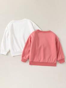 两件装女童休闲百搭舒适毛绒内衬圆领宽松长袖套头卫衣，两种款式各一件，适合通勤、上学、日常休闲、旅行、运动、秋冬季穿着。 - 粉色 - 查看 2