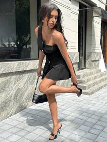 Chiquease مجموعة من 2 قطعة: سترة كتف غير متماثلة وتنورة مطوية