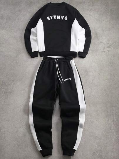 STYNVO Conjunto de sudadera y pantalones de manga larga con cuello redondo casual, de color contrastante, con gráfico de letra, forrado térmico, para hombre. Conjunto de 2 piezas en negro y blanco, para invierno.