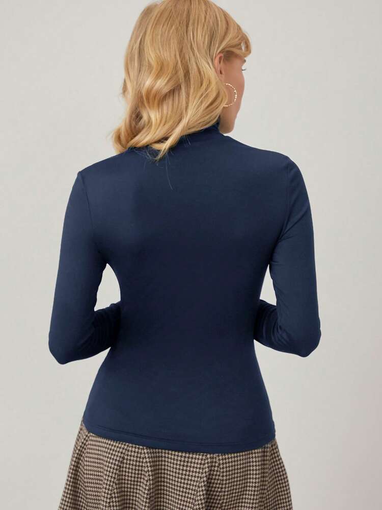 HIGH NECK FORM FITTED TEE