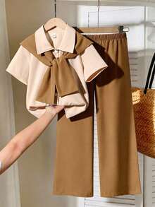 SHEIN مجموعة قميص كاجوال أبيض مخطط بأكمام قصيرة لل...