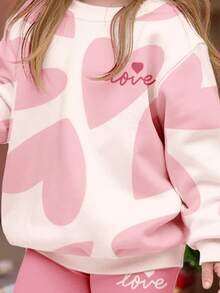 可爱粉色套装，萌萌少女抽象几何爱心印花，休闲舒适柔软保暖圆领长袖卫衣和打底裤，适合秋冬季日常穿着、新年、外出、居家。