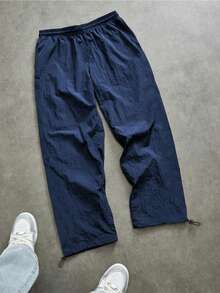 Manfinity Sport Corelite 男士印花白色短袖上衣和蓝色抽绳腰带运动裤套装