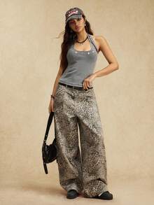 Easelle Women's Sexy And Stylish Streetwear Backless Halter Top, Summer Style, Adorned With Metal Eyelet Details. (2025 Party/Music Festival)