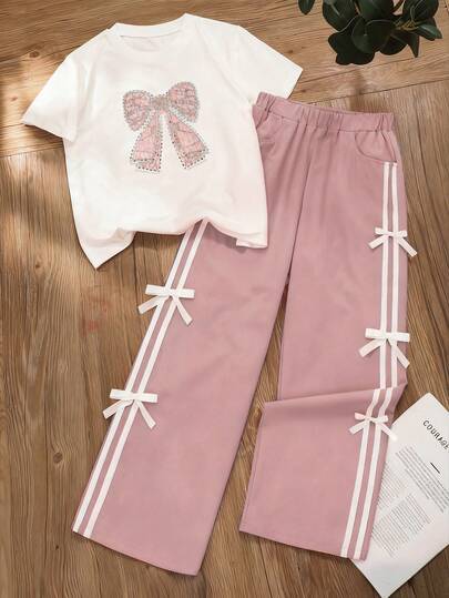 Sparklyn Conjunto de 2 piezas de top con decoración de lazo de strass y pantalones a rayas con lazo para niñas, moda callejera