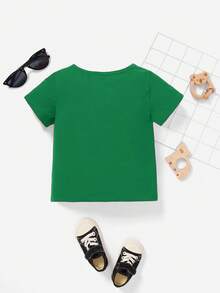 SHEIN Top à manches courtes pour bébé garçon, style mode minimaliste classique pour Noël, chaud et confortable, avec motifs d'arbre de Noël, de dessin animé et de renne mignon. Convient pour l'été.