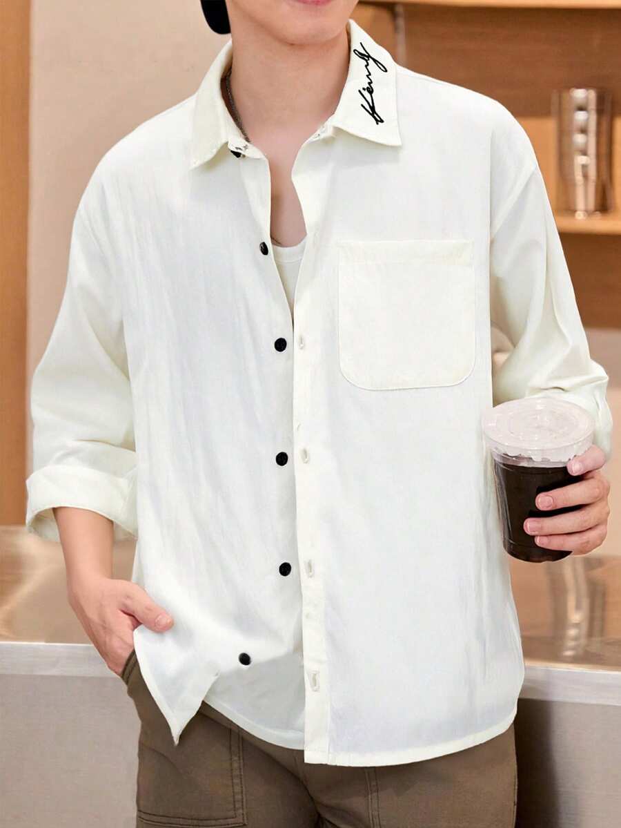 一件青少年男童简约优雅长袖衬衫,白色面料,黑色纽扣点缀,领口刺绣装饰,面料舒适,修身剪裁,春季新品,四季皆宜,百搭颜色。 - 白色 - 查看 1