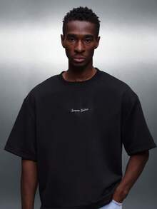 PLAYBOY X SUMWON Boxy Fit Short Sleeve T-Shirt With Back Graphic Print And Script Text Design Casual Everyday Wear Summer Spring Top - Black - View 5