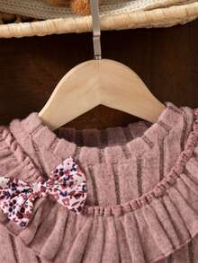 Souflis Souflis Infant/Baby Girl Knitted Round Neck Floral Ruffle Hem Dress, Lotus Root Pink