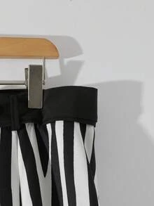 GlowEve CURVE Gestreifter A-Linien Rock in Große Größen für Damen, lässig, locker geschnitten, elegant und vielseitig einsetzbar für Party, Alltag, Herbst/Winter - Verschiedenfarbig - Übersicht 4