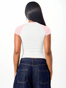 SUMWON WOMEN Contrast Raglan Sleeve Baby Tee With Retro Oval Graphic Design Short Sleeve Crop Top For Casual Summer Style - Baby Pink - View 2