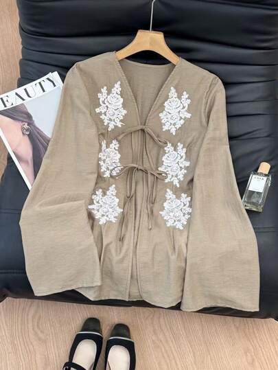 SHEIN Frenchy Women's Applique Decor Front Tie Long Sleeve Loose Blouse Lace Shirts Boho Shirts Women Western Blouse Western Tops Lace Top,Elegant Shirts For Women Elegant Women's Blouses And Shirts Business Casual Women Shirts,Autumn/Winter, Thanksgiving Shirt, Casual Blouses For Women, School Shirt, Elegant Women's Blouses,Suitable For Everyday Outings And Commuting, Autumn/Winter Women's Clothing. Casual,New Year Blouses Spring Green