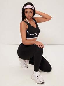 Medorelle Bộ đồ tập yoga 2 món viền đen trắng dành cho nữ - màu đen - Xem 5