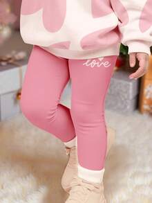 可爱粉色套装，萌萌少女抽象几何爱心印花，休闲舒适柔软保暖圆领长袖卫衣和打底裤，适合秋冬季日常穿着、新年、外出、居家。