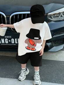 SHEIN 2pcs/Set Young Boy Kids Comfortable Daily Versatile Casual Cute Loose Fit Japanese And Korean Style Animal Bear Pattern Embroidered Round Neck Short Sleeved T-Shirt Knitted Top And Yellow Waffle Shorts Set, Suitable For Spring And Summer Seasons, Daily Life, Sports, Campus, Gatherings, Festivals, Performances, Photography, Back To School Season - Black - View 1