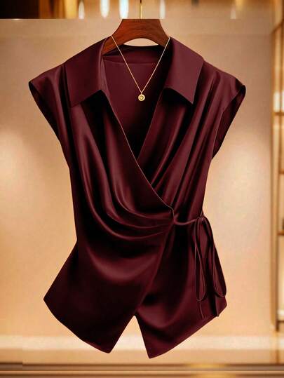 GlowEve CURVE 大码无袖衬衫，褶裥领，前开襟，配蝴蝶结，时尚百搭，适合派对和正式场合。