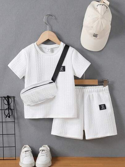 3pcs/Set Young Boy Fashion Cute Round Neck Ribbed T-Shirt With Letter Jacquard, Shorts And Crossbody Bag, Suitable For Daily Wear, School, Casual Outing, Shopping, Vacation, Dining And Other Occasions, Suitable For Spring, Summer And Autumn