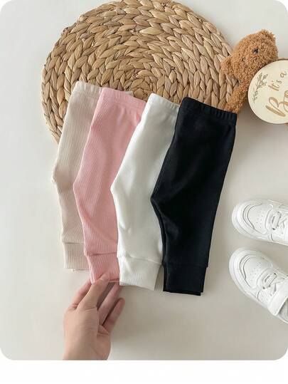 SHEIN 4 piezas Pantalones elásticos de cintura sólida de punto para bebé recién nacido, versátiles para otoño/invierno