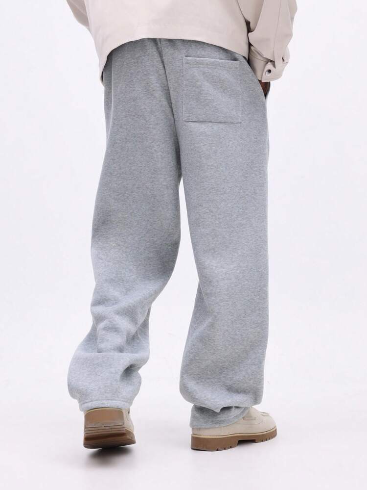 Wide Leg Sweatpants With Embossed Print