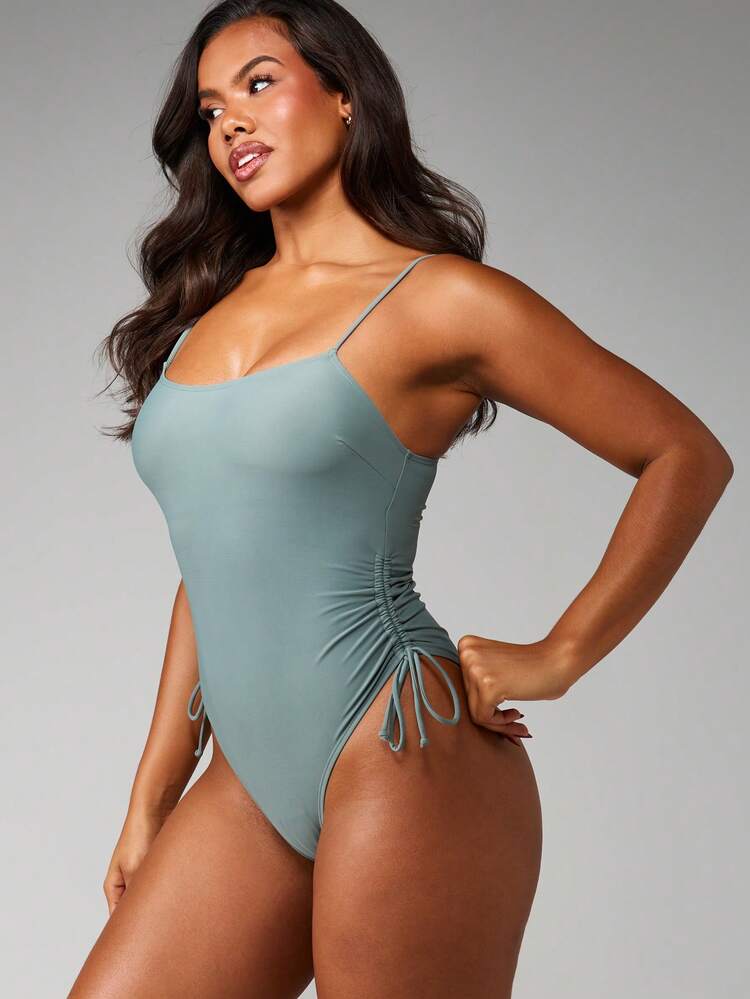 MISSGUIDED Costume da bagno intero con spalline a spaghetti, arricciature laterali e dettaglio con fiocco, adatto per l'estate, la spiaggia, la piscina e le vacanze