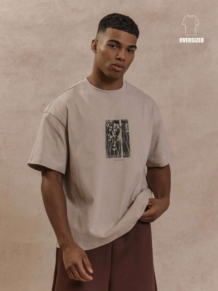 Musero Camiseta de manga corta con estampado gráfico floral y corte oversize para otoño e invierno