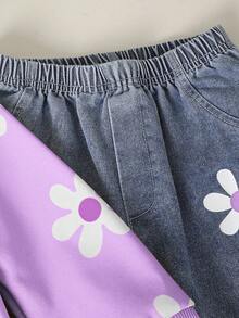 Sparklyn 这款女童可爱碎花卫衣套装适合春、秋、冬三季以及开学季穿着。针织卫衣饰有黄色碎花图案，罗纹袖口、领口和下摆，长袖设计，搭配黄白碎花蓝色牛仔裤，两件套，适合女孩日常穿着，可爱又优雅，适合上学、外出、聚会等场合。 - 紫色 - 查看 5