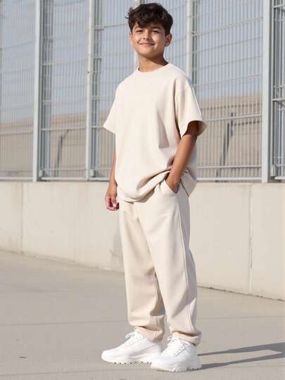 Vacaura 2pcs Casual Outfit For Teenage Boys, Featuring Oversized Crew Neck Top With Dropped Shoulders And Loose Cuffs, Complemented By Solid Straight-Leg Pants. Comfortable And Suitable For Summer And Autumn Seasons. Teen T Shirt And Pants Teen Boy Two Piece Set Teen Boy Sweatpants Set