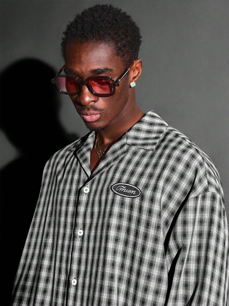 Camisa de cuadros con botones y logo ovalado