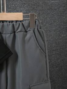 SHEIN Vacaura Bộ 2 món cho bé trai tuổi mới lớn: Áo thun tay ngắn in chữ và quần dài túi màu trơn - Xám - Xem 3