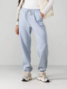 MISSGUIDED Pantalones de chándal con cordón en azul claro con detalles de botones y puños elásticos para comodidad casual en invierno y primavera - Gris Oscuro - Ver 1