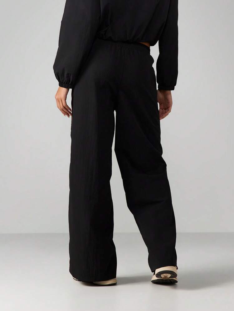 MISSGUIDED Women's Wide Leg Nylon Sweatpants With Side Stripe Detail Elastic Waist Casual Loose Fit Full Length Track Pants For Everyday Comfort