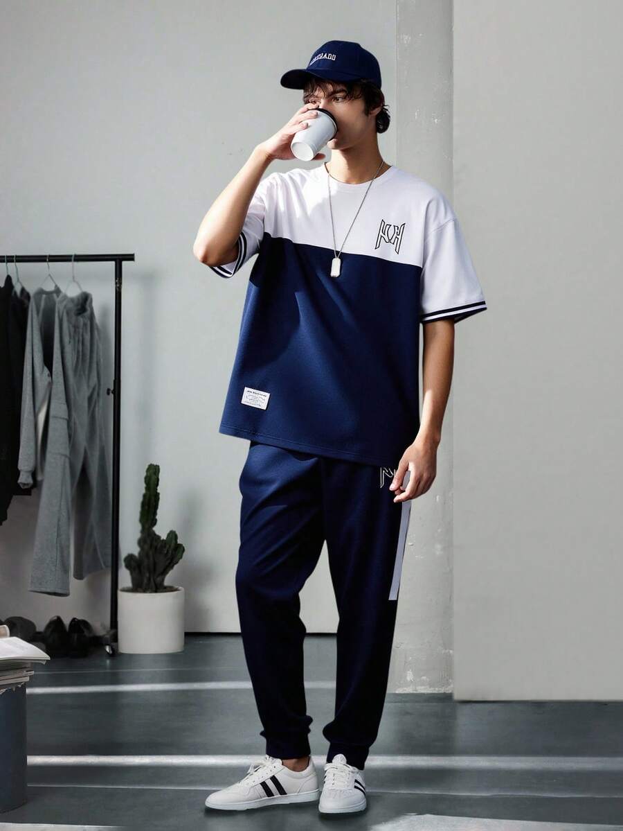 Vacaura 2件套青少年男童休闲撞色拼布字母印花T恤和运动裤套装 - 藏蓝色 - 查看 1