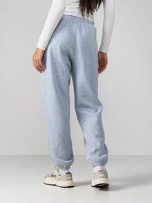 MISSGUIDED Pantalones de chándal con cordón en azul claro con detalles de botones y puños elásticos para comodidad casual en invierno y primavera - Gris Oscuro - Ver 2