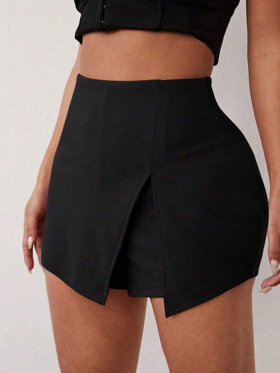Falda corta cruzada CINTURA AMPLIA de moda para mujer con detalle de abertura en el muslo, tela muy elástica, estilo casual - Negro - Ver 1