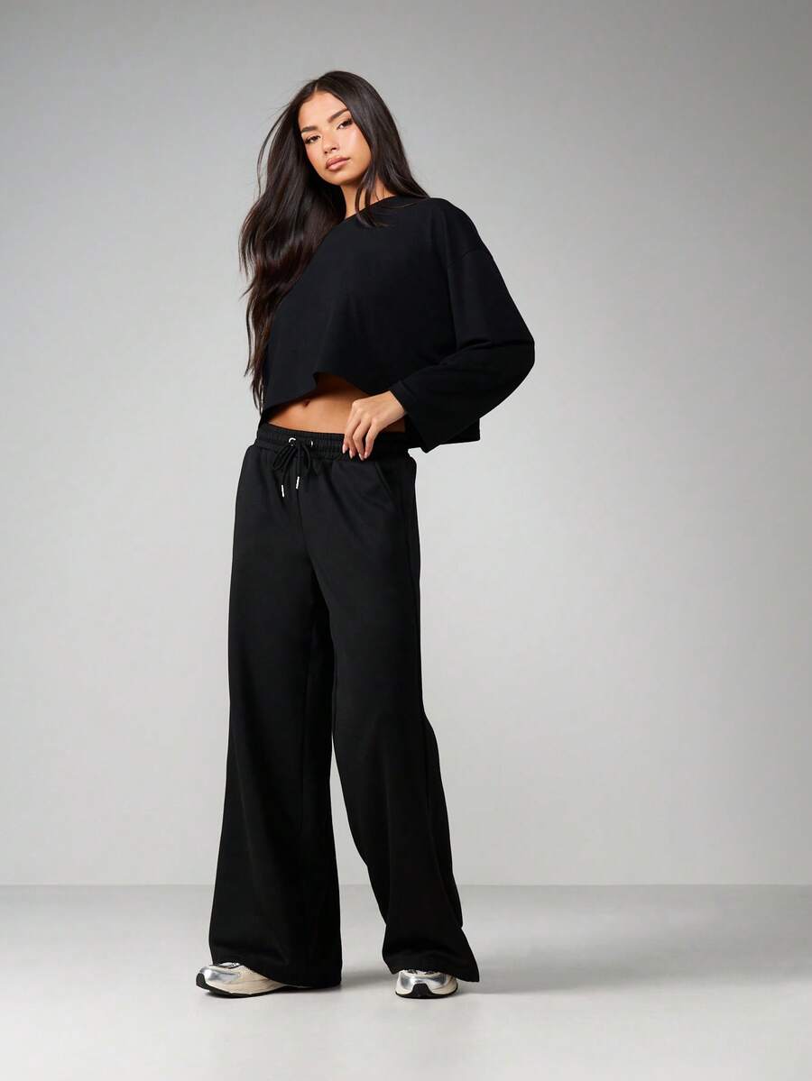 MISSGUIDED Bộ đồ hai mảnh áo nỉ crop top rộng và quần jogger ống rộng thoải mái mặc nhà thu đông - màu đen - Xem 1