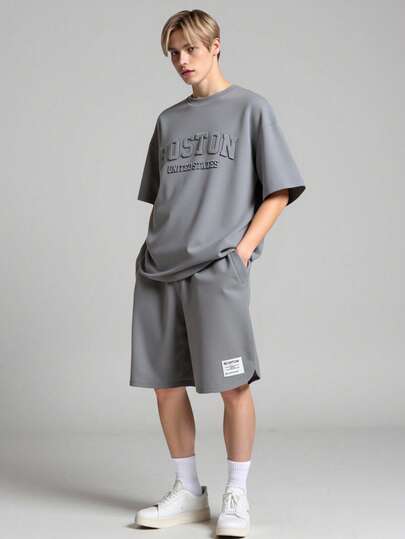 Vacaura Boy Summer Outfit 2pcs Casual Outfit For Teenage Boys, Fashionable Stereo Steel Stamping English Graphic Round Neck Pullover T-Shirt With Curved Side Design, Shorts With Minimalist Textured Trim And Curved Leg, Suitable For Summer And Autumn Summer Holiday