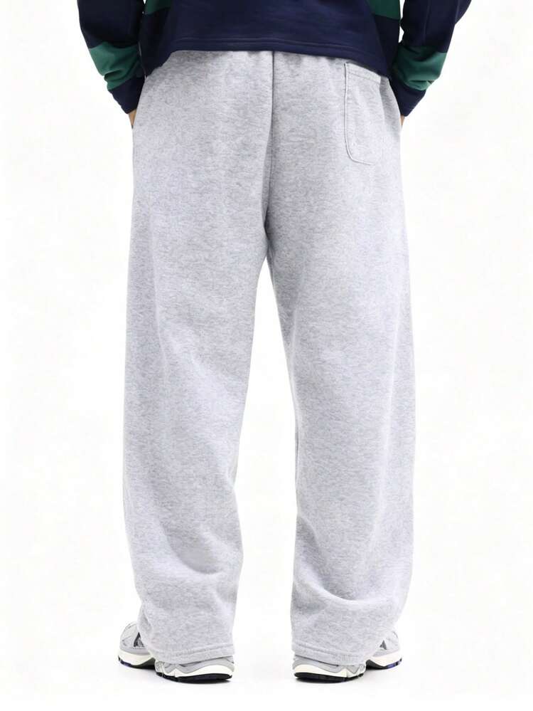 Melierte Jogginghose mit Grafikprint