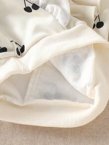 SHEIN 2pcs Baby Girl Cute Sweet Fashion Casual Cream White All Over Black Cherry Fruit Print Pattern Ruffle Trim Long Sleeve Round Neck Sweatshirt Pullover Tops And Elastic Waist Sweatpants Joggers Pants Two Pieces Outfit Sets Thick Soft Clothes For Daily Wear School Party Spring Fall Autumn Winter - Beige - View 9