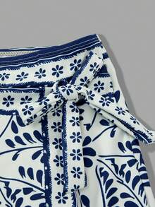 Swim Oasis 法国南部高端度假风鹦鹉系带连体裙