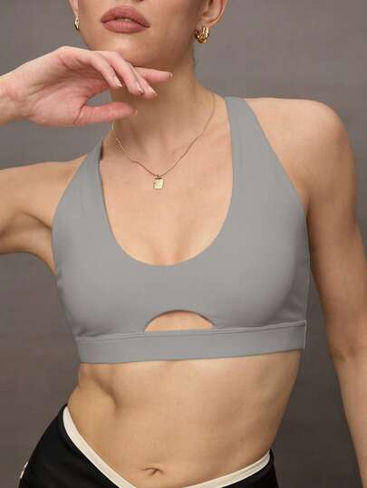 Activina Sujetador deportivo de mujer de unicolor, con cuello en U y diseño hueco y transpirable