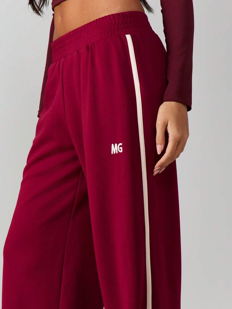 MISSGUIDED Burgundy MG Wide Leg Sweatpants With Side Stripe Detailing Elastic Waistband Relaxed Fit Joggers For Casual Comfort
