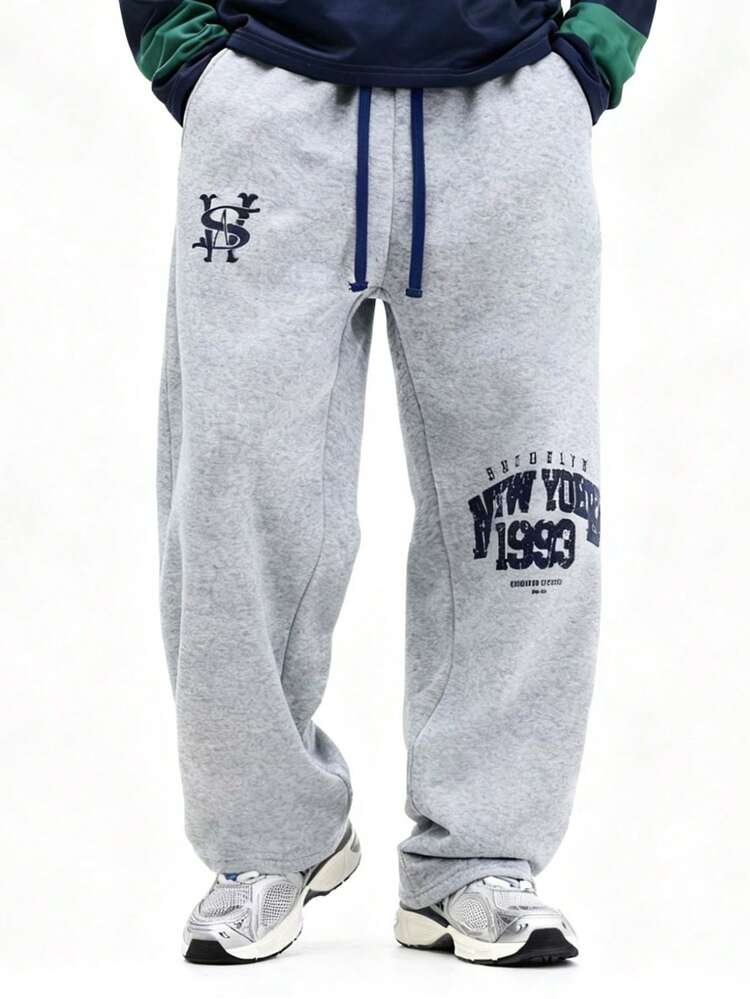 Melierte Jogginghose mit Grafikprint