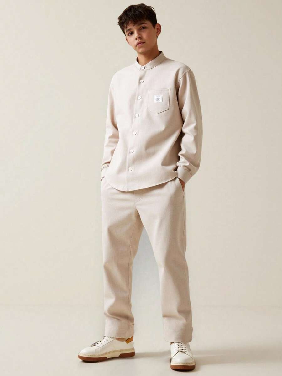 男童休闲修身衬衫两件套，胸前有贴布和口袋，搭配直筒裤，适合派对、主持、钢琴演奏会、聚会、走秀、洗礼、商务活动、生日、婚礼、毕业典礼、婚礼宾客、花童、戒指童等各种场合，四季皆宜。 - 杏色 - 查看 1